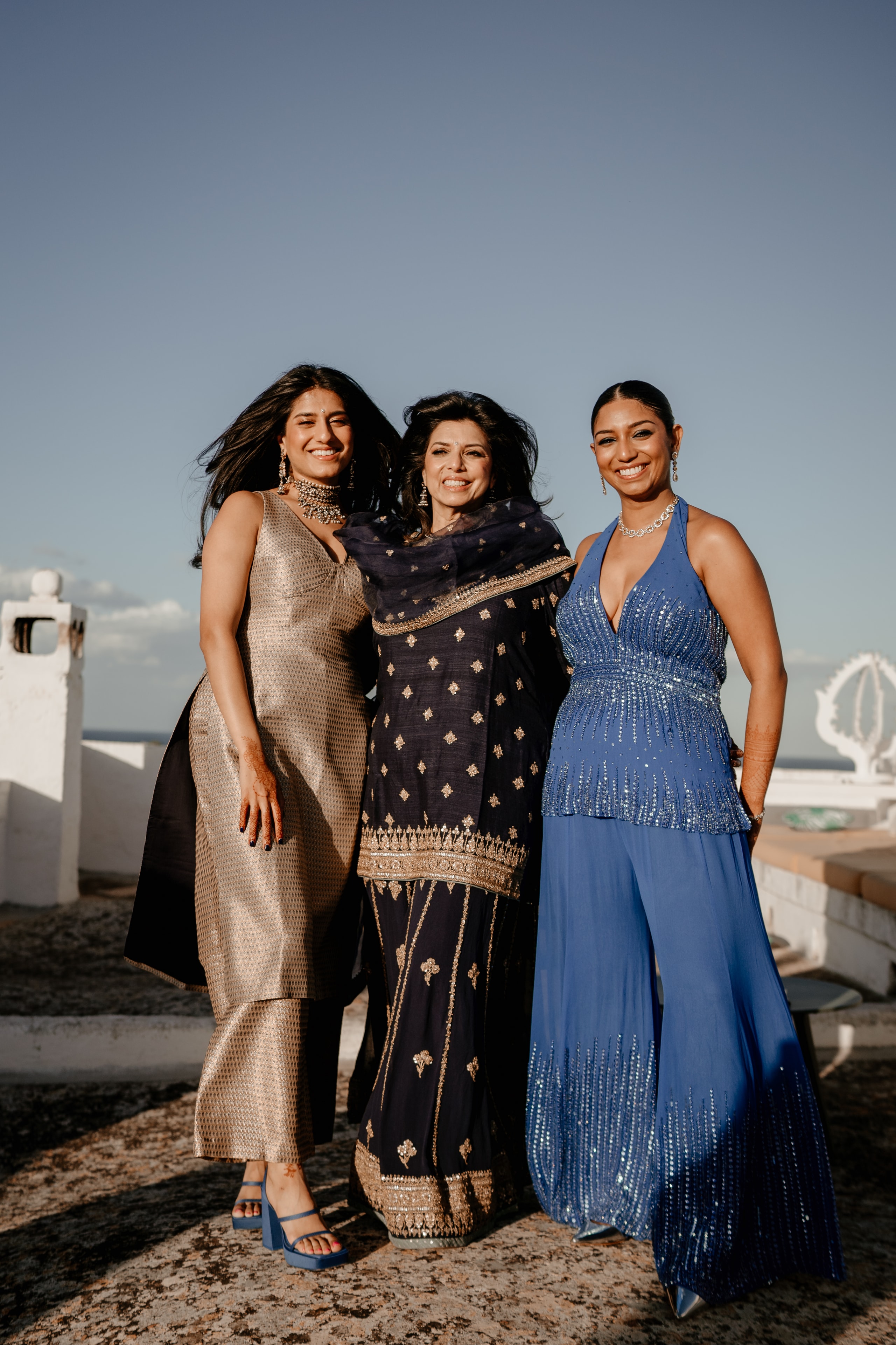 Guests celebrating at a Puglia by Nesan wedding event overlooking the Adriatic